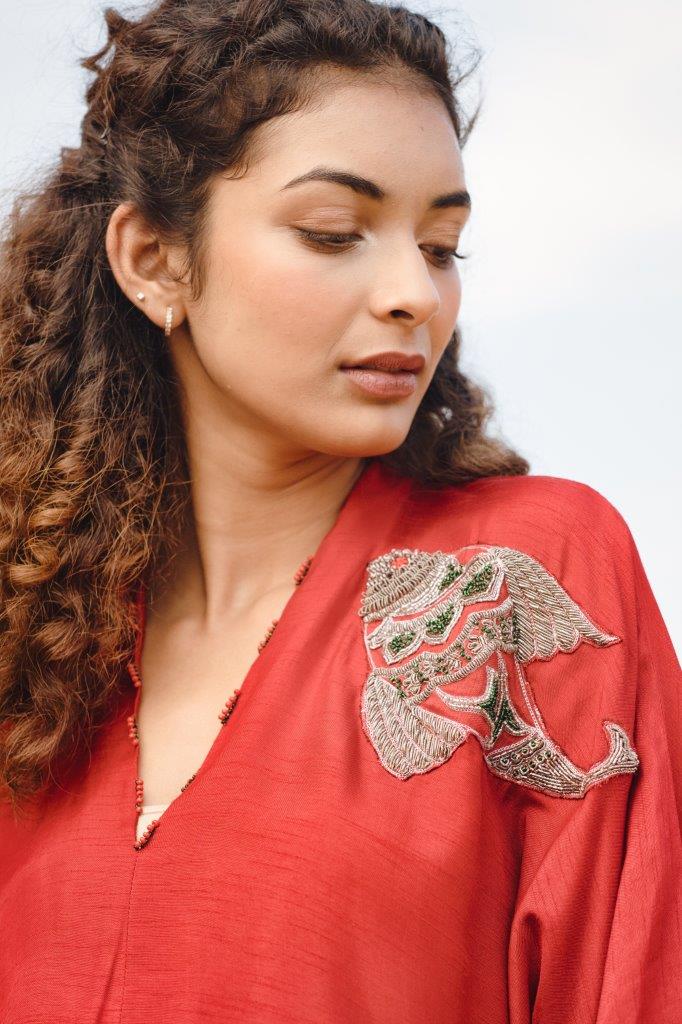Red pleated dress with fish motif Aditi Somani India