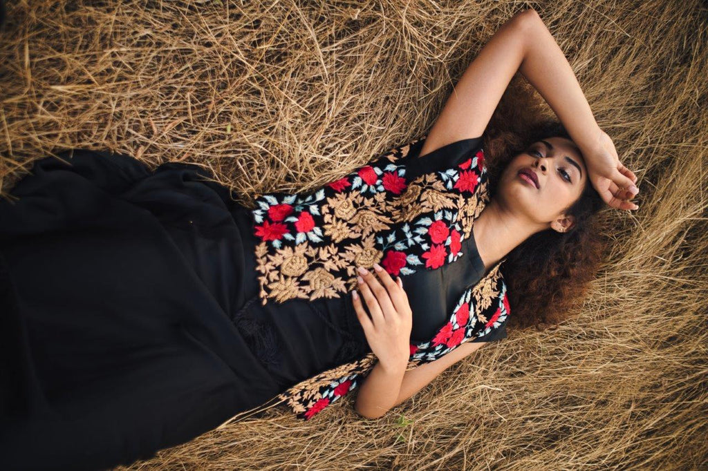 Black silk cowl dress with black embroidered velvet jacket