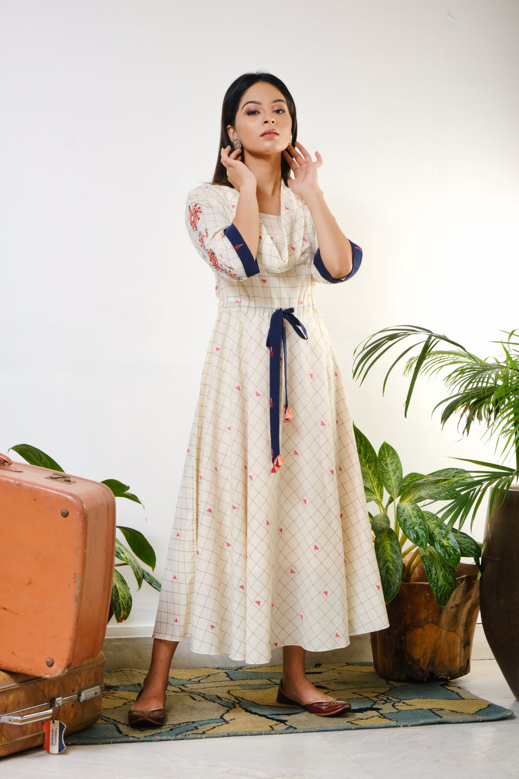 Off-white checked tunic with mirror-thread geometric embroidery