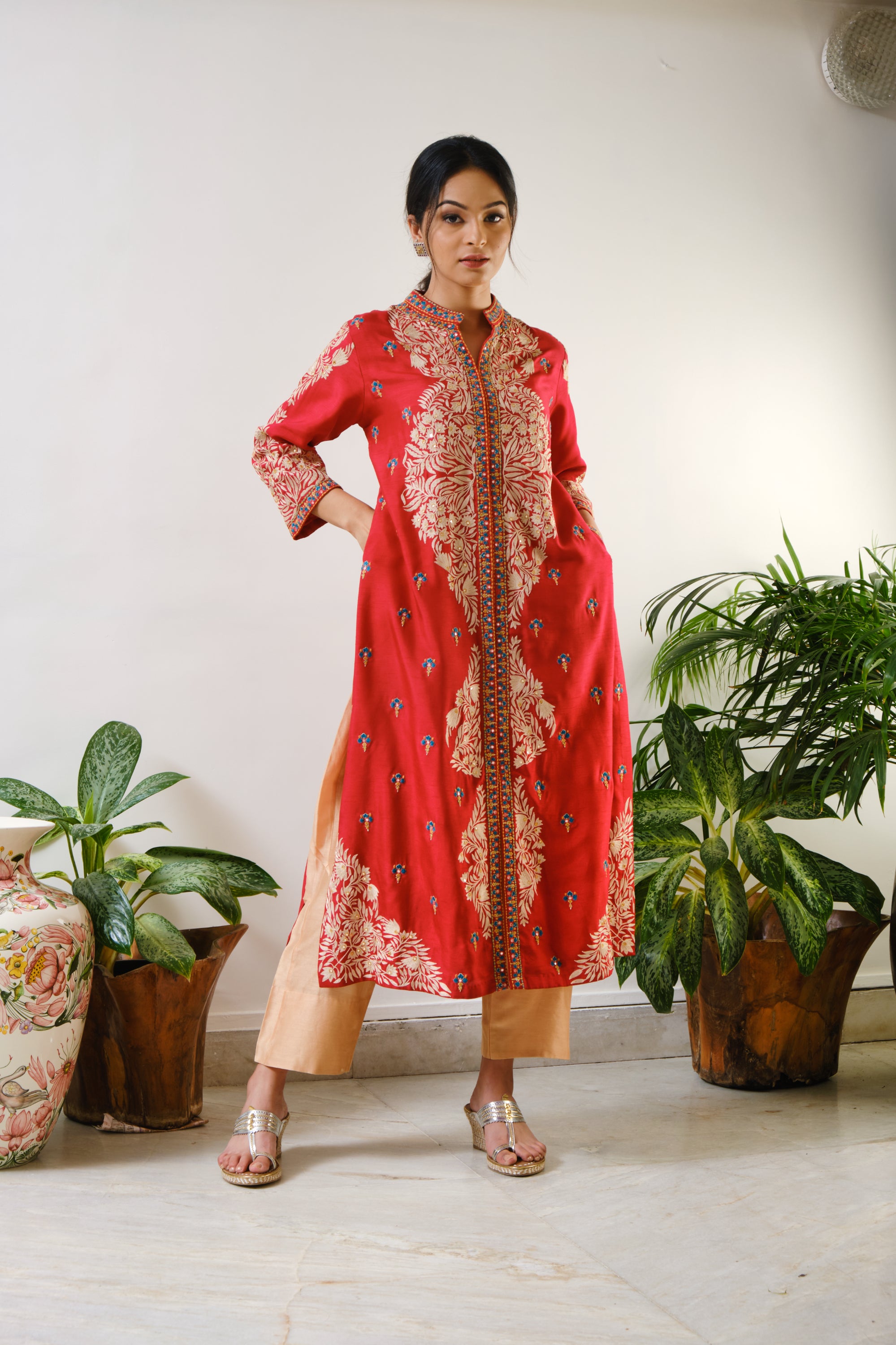Red embroidered jacket with ari-mirror embroidery